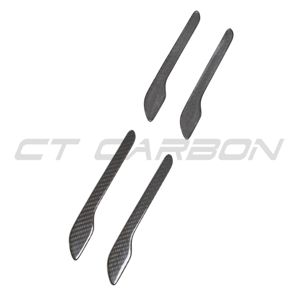 Tesla Model 3 and Y 2017+ carbon fiber handle covers by CT Carbon, showing sleek, textured carbon fiber surface on vehicle door handles.