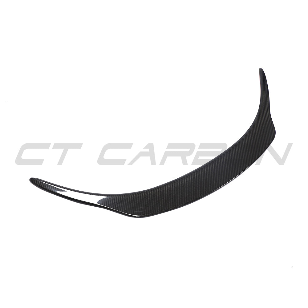 Carbon fiber spoiler for Toyota Supra 2019+ A90 by CT Carbon, shown on the car’s rear with a sleek, aerodynamic design.