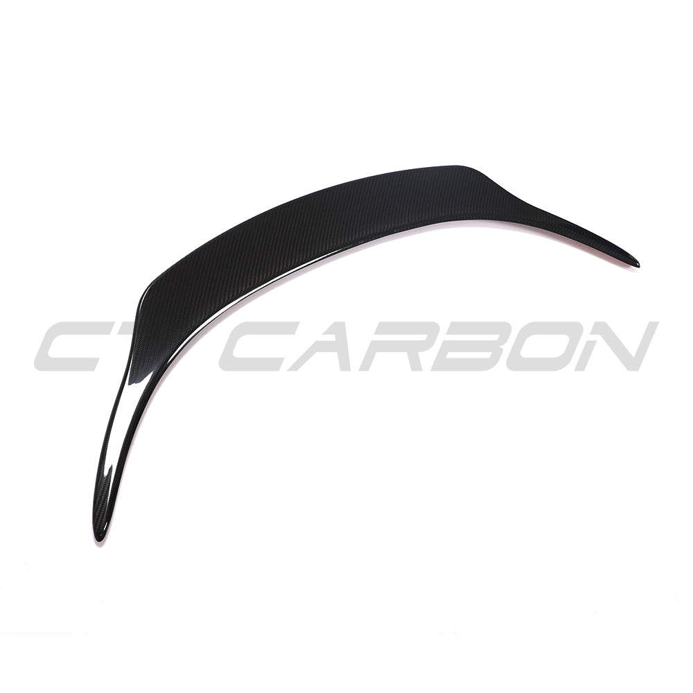 Toyota Supra 2019+ A90 carbon fiber spoiler by CT Carbon, shown mounted on the car with a sleek, aerodynamic design.