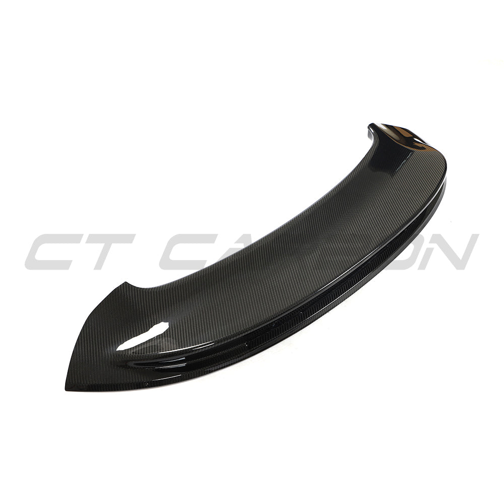 CT Carbon Porsche 992 Carrera GTS 2018+ carbon fiber replacement ducktail spoiler on a sports car.