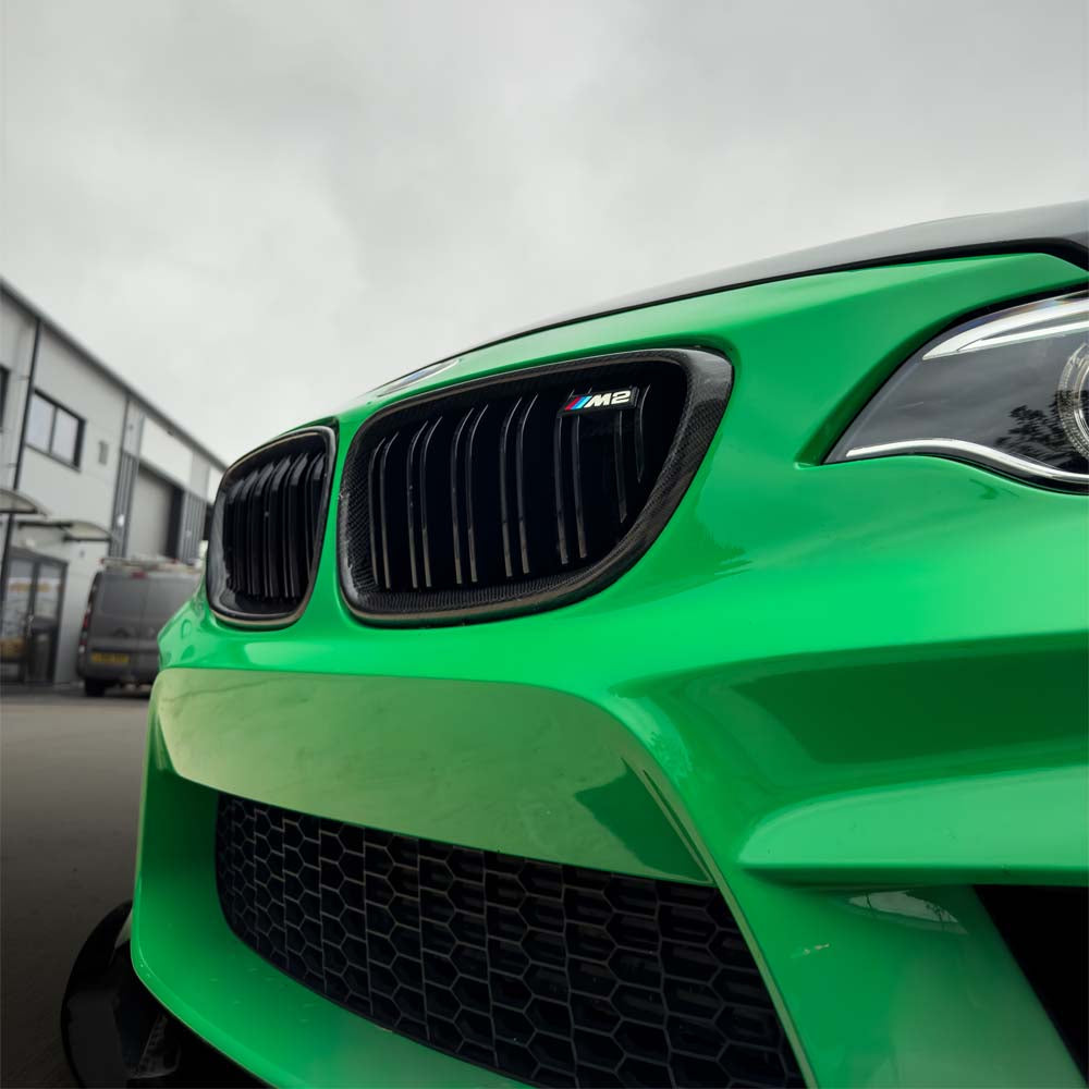 BMW F87 M2 M2C CT Carbon full carbon fiber kit installed on the car, showcasing lightweight, high-performance body components.
