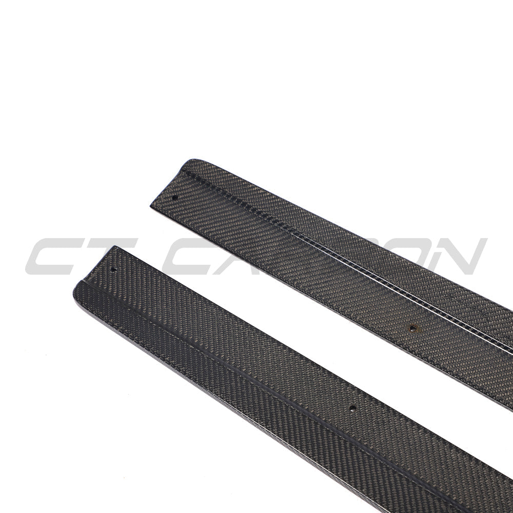 Carbon fiber side skirts for Audi RS6 C7/C7.5 2013-2018, installed on the car's side, enhancing sporty appearance and aerodynamics.