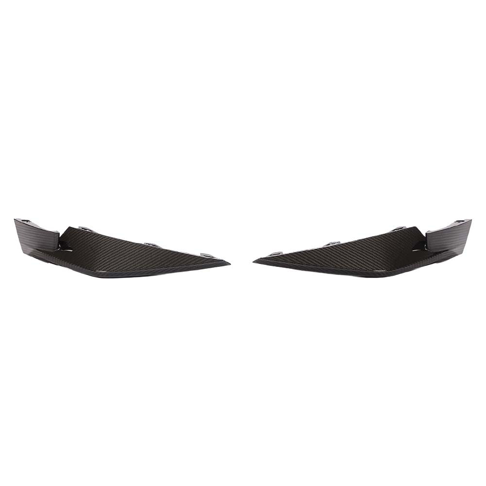 BMW M3 M4 G80 G82 G81 G83 carbon fibre front bumper corner replacements by CT Carbon, shown on a sleek car.