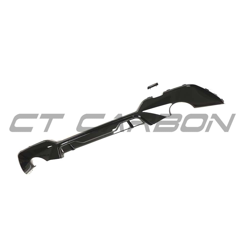 BMW G20/G21 3 Series 2019-2022 CT Carbon gloss black round exhaust diffuser on car rear.