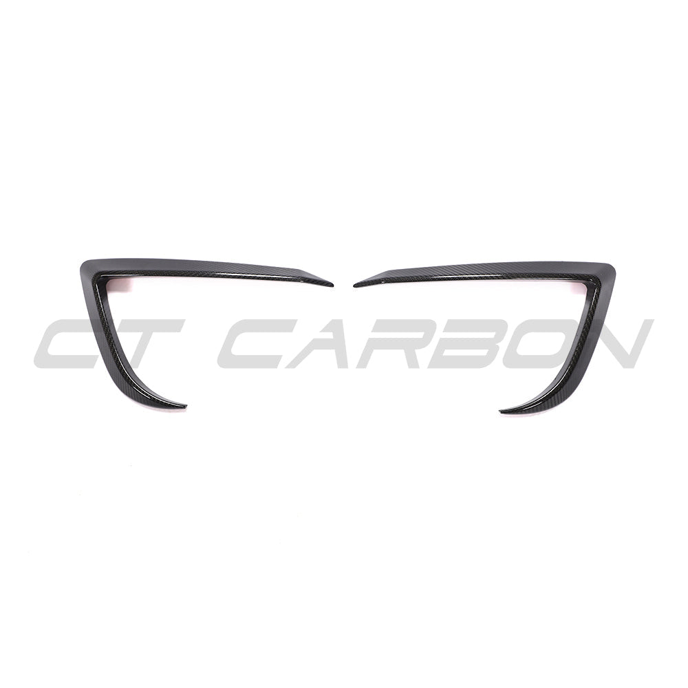 CT Carbon carbon fiber front bumper canards for Tesla Model 3 (2017-2023), highlighting sleek aerodynamic accessories.