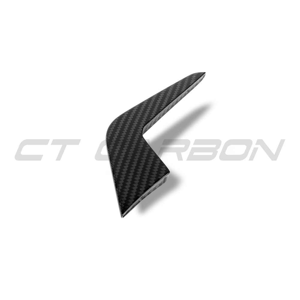 Carbon fiber canards for Audi RS5 B9.5 Sportback and Coupe 2020-2025, by CT Carbon, shown on the vehicle's front bumper.