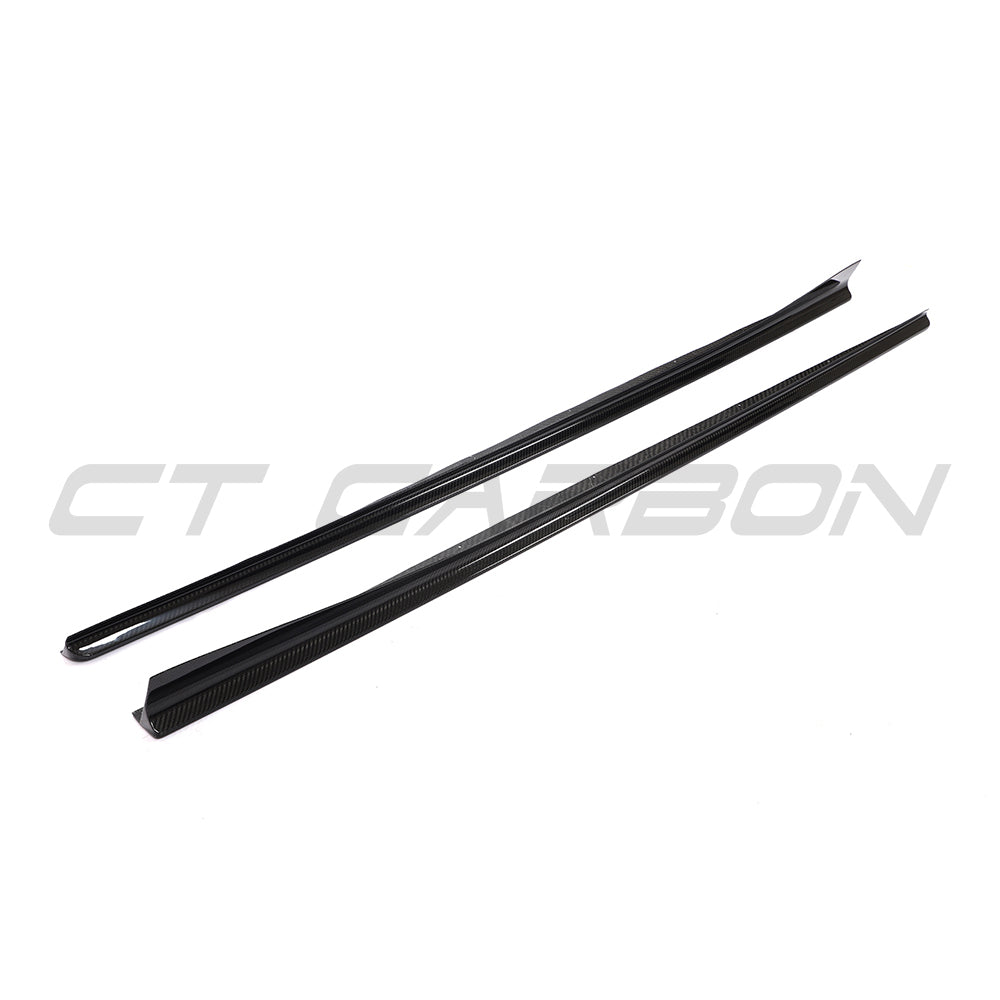 BMW 8 Series M8 G15/F92 carbon fibre side skirts by CT Carbon, installed on the side of the sports car, enhancing aerodynamics.
