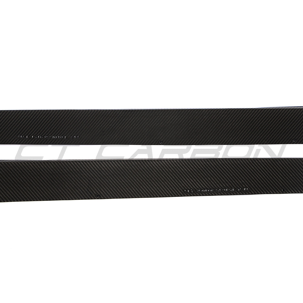 BMW 8 Series M8 G15 F92 carbon fibre side skirts by CT Carbon, showcasing sleek, lightweight automotive body enhancements.