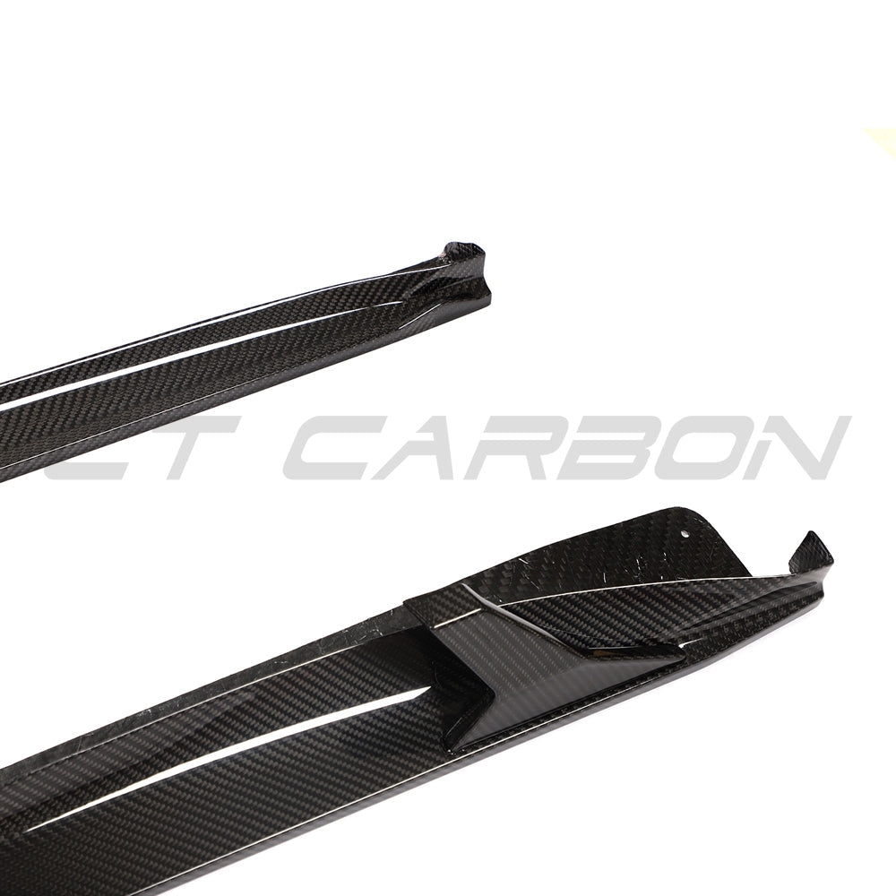 Porsche 911 991.2 GTS 2017-2019 carbon fibre side skirt extensions on a sports car, showcasing sleek aerodynamic design.