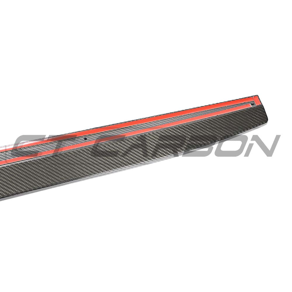 Mercedes E63 W213 2018-2020 CT Design carbon fiber side skirts installed on the vehicle, showcasing sleek aerodynamic styling.