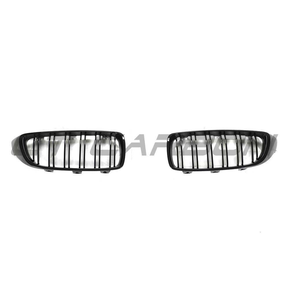 BMW M3 F80 black double slat grille by CT Carbon, showcasing the sleek, matte black finish and detailed grille design.