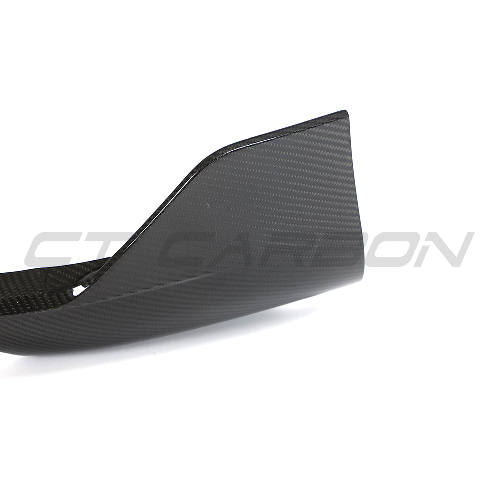 CT Carbon Porsche 992 Carrera 2018-2024 carbon fibre corner splitters installed on front bumper, enhancing sporty appearance.
