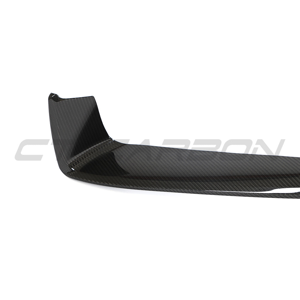 CT Carbon Porsche 992 Carrera 2018-2024 carbon fibre corner splitters installed on front bumper for enhanced aerodynamics.