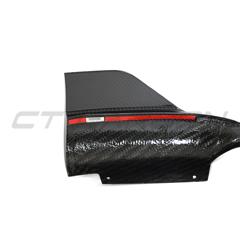 CT Carbon Porsche 992 Carrera 2018-2024 carbon fibre corner splitters, close-up view showing sleek aerodynamic design.