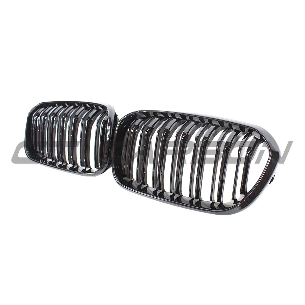 BMW F20 1 Series LCI double slat gloss black grille by CT Carbon, showing close-up of sleek, high-quality car grille design.