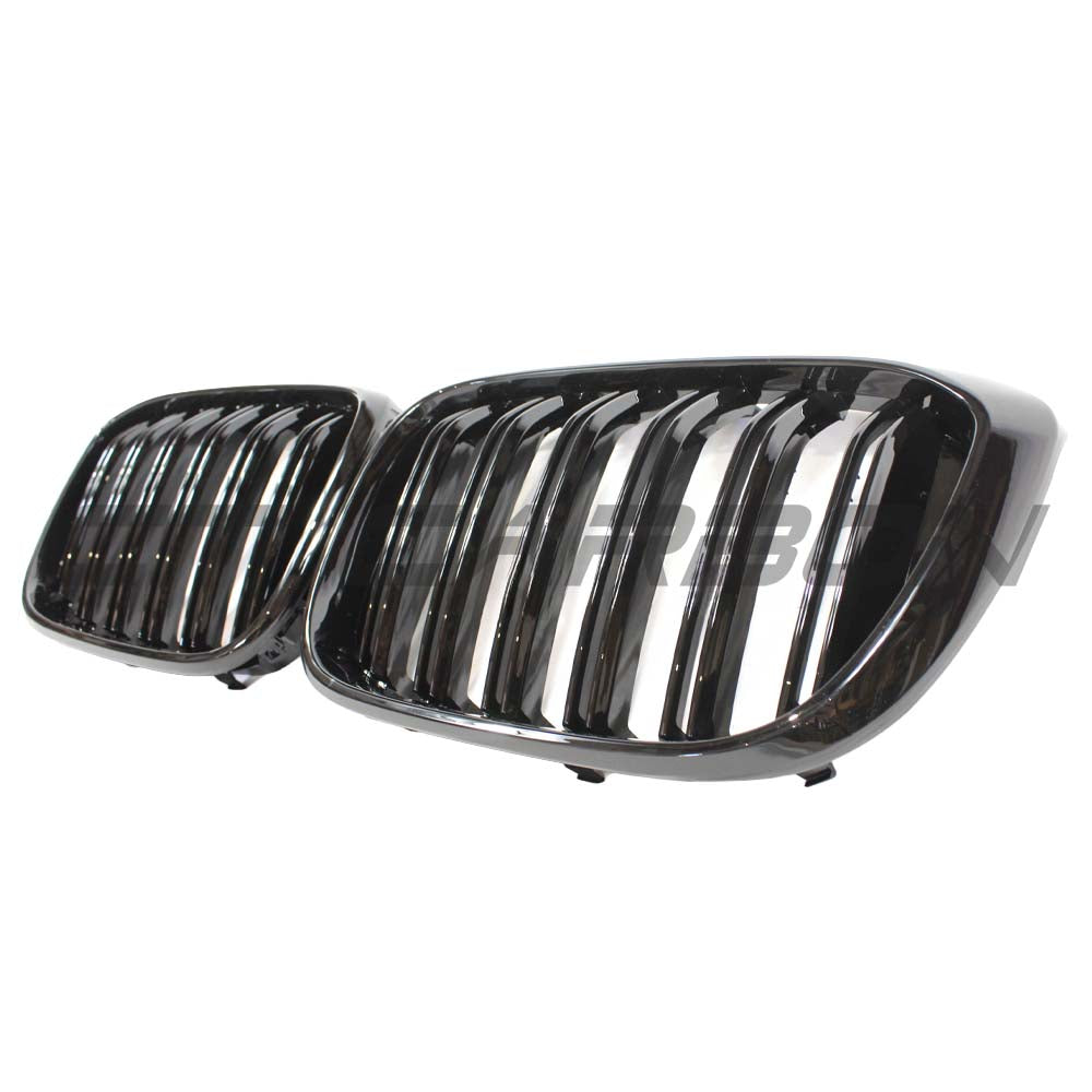 BMW G01 X3 2017-2021 CT Carbon double slat black grille installed on front of vehicle, showcasing sleek design and finish.