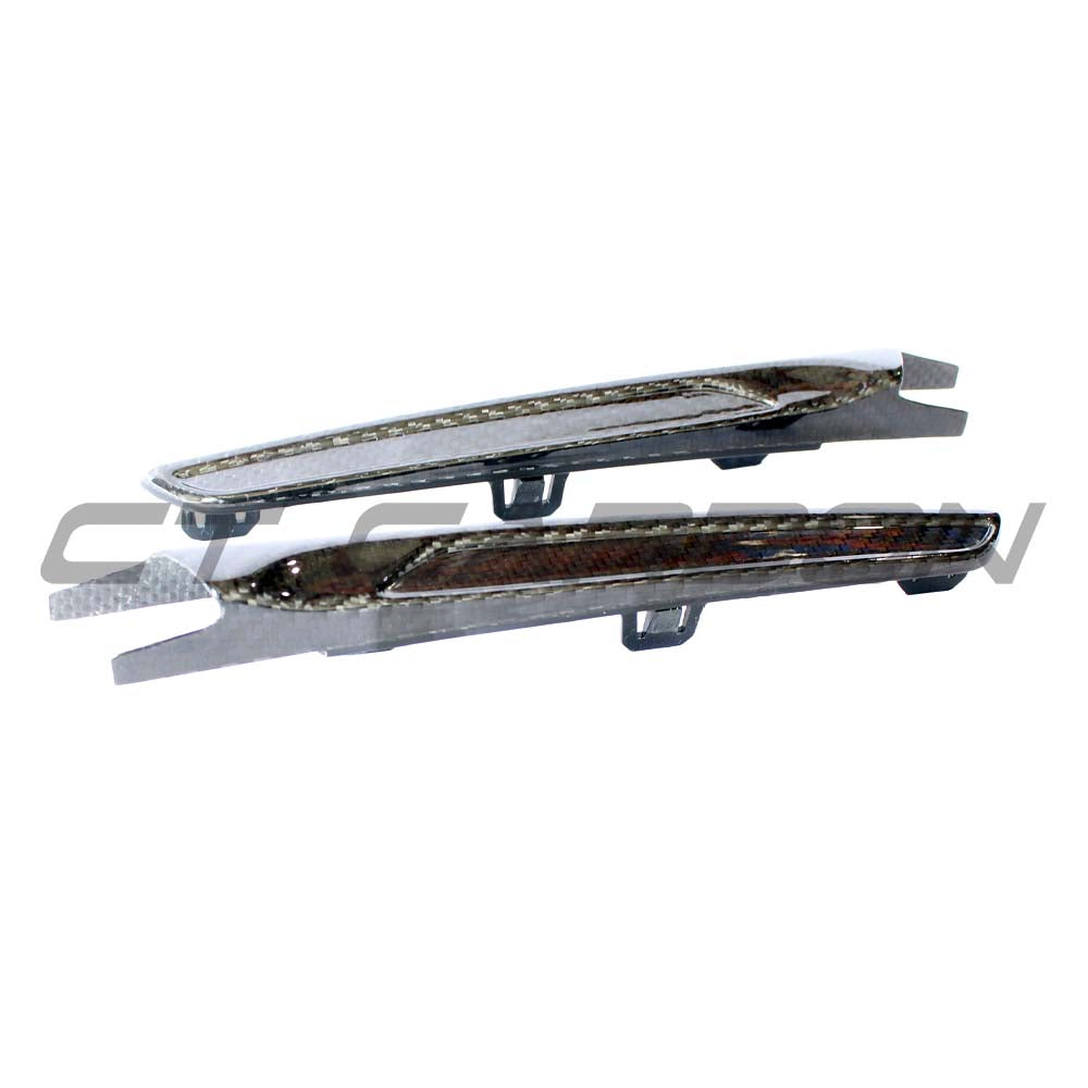 BMW M3 M4 F80 F82 F83 carbon fiber side vents accessory by CT Carbon, showing sleek carbon fiber finish and aerodynamic design.