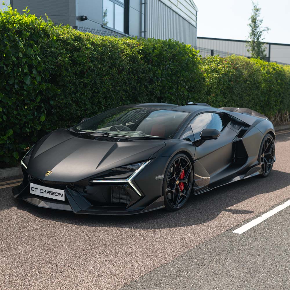 Lamborghini Revueltó carbon fiber side skirts by CT Carbon, showcasing sleek, aerodynamic automotive body kit components.