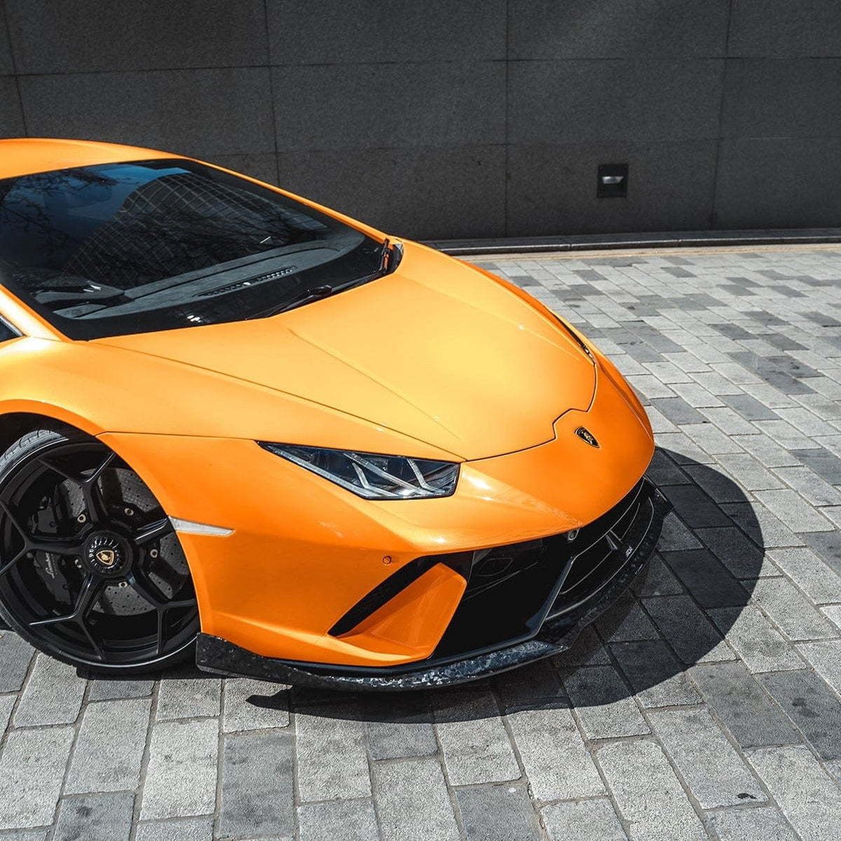 Lamborghini Huracan Performante full kit by CT Carbon featuring aerodynamic body parts and carbon fiber accents.
