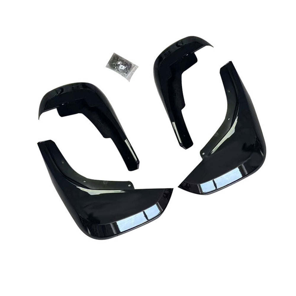 Gloss black mud flaps for Land Rover Defender L663 110 and 90, made by CT Carbon, designed as durable vehicle accessories.