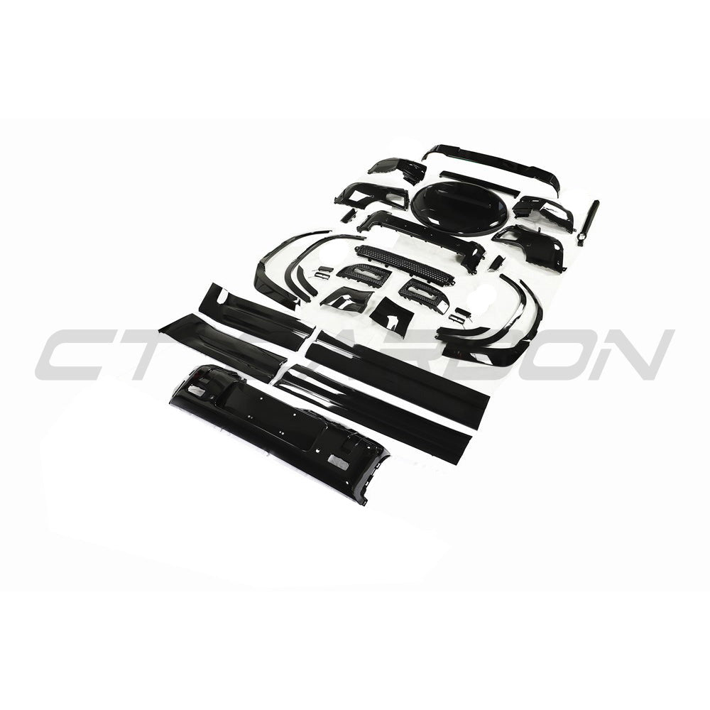 CT Carbon gloss black kit for Land Rover Defender L663 110, featuring black accents and styling components on the vehicle.