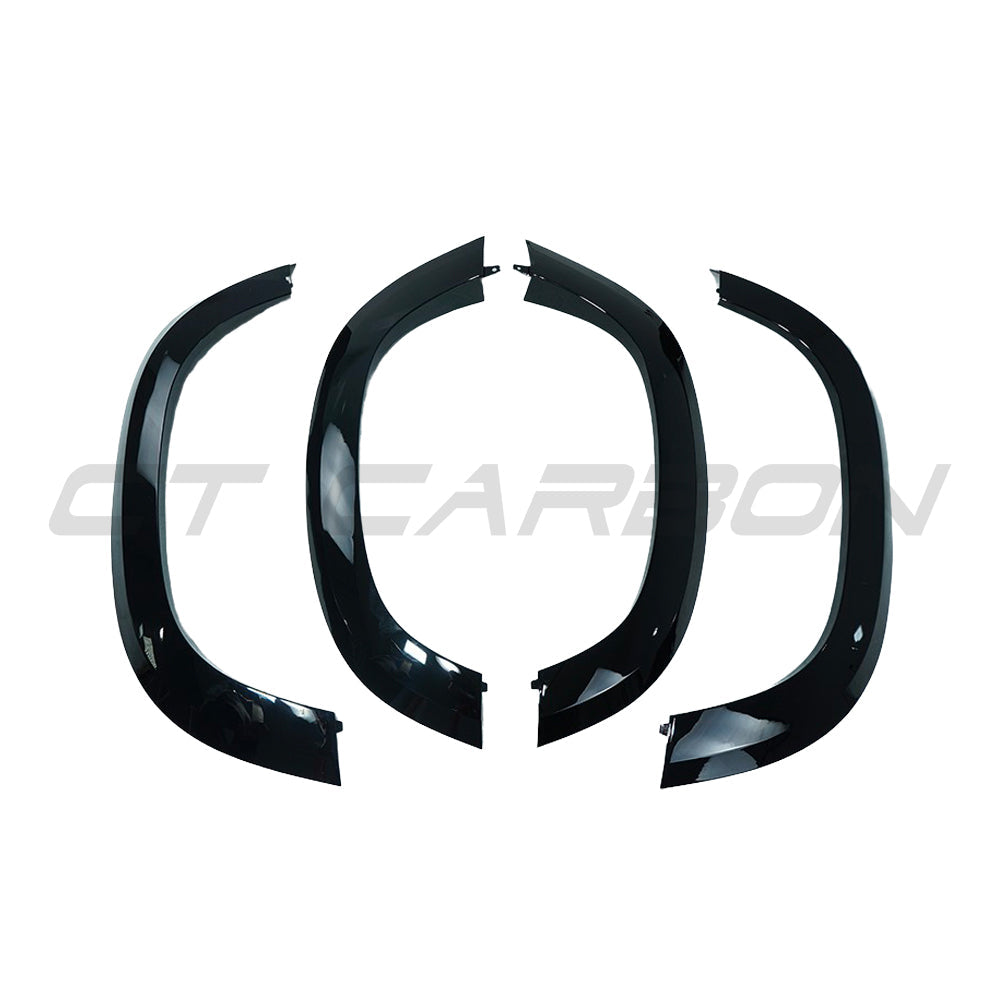 Gloss black wide arch fenders for Land Rover Defender L663 90 by CT Carbon, showcasing their sleek, wide-profile design.