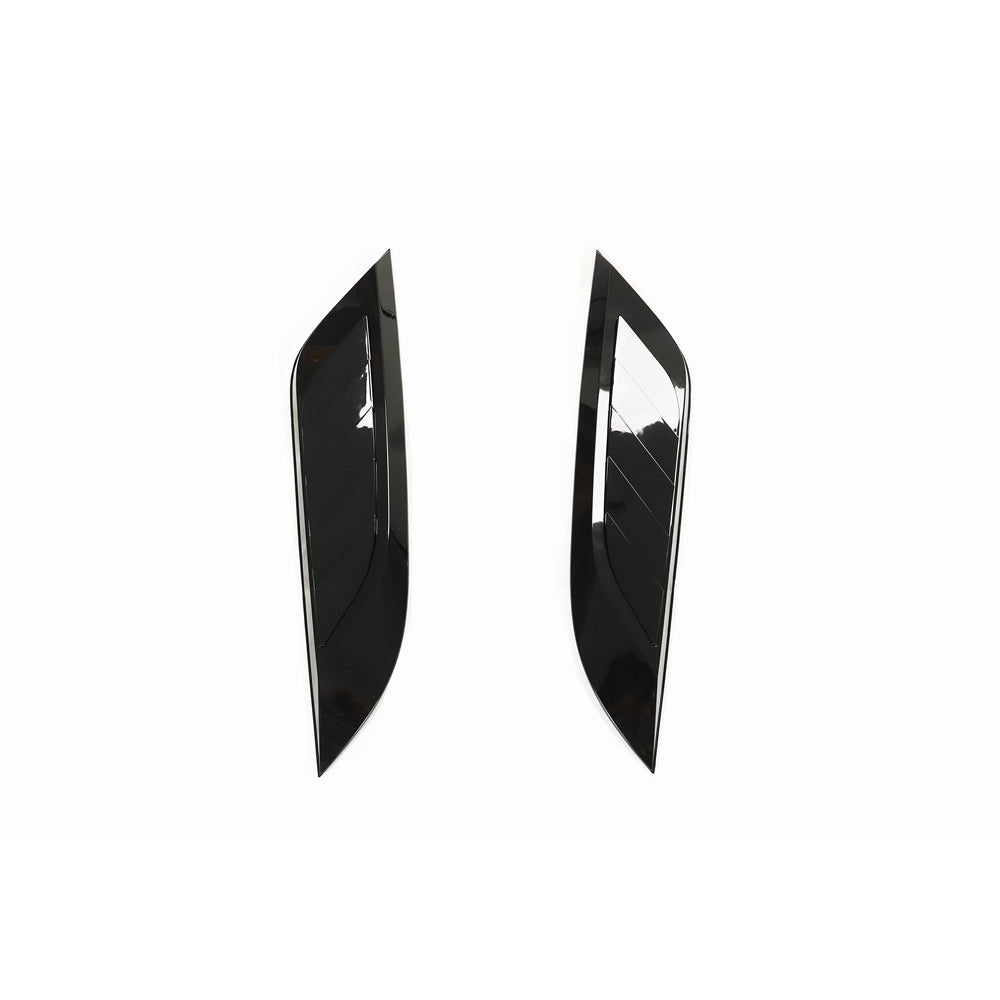 Gloss black Land Rover Defender L663 hood trim accessory by CT Carbon, showcasing the sleek, high-quality exterior detail.