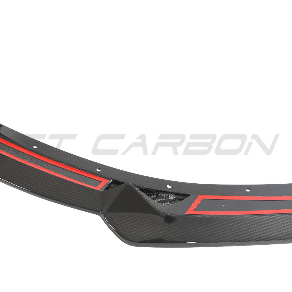 Carbon fiber front splitter for Lotus Emira by CT Design, showcasing sleek, aerodynamic design for enhanced vehicle performance.