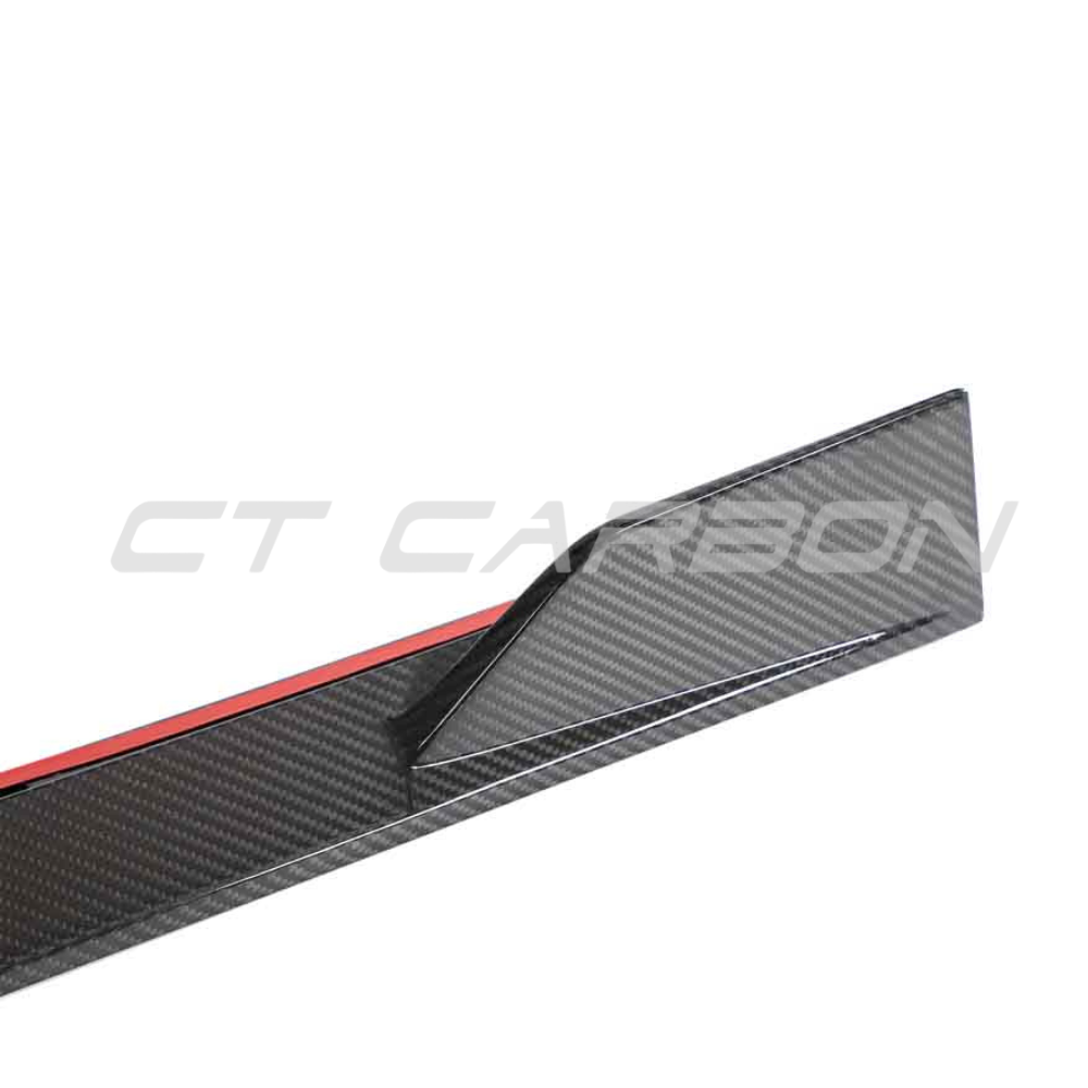 Lotus Emira carbon fibre side skirts by CT Design, showcasing sleek, lightweight automotive accessories with a glossy finish.