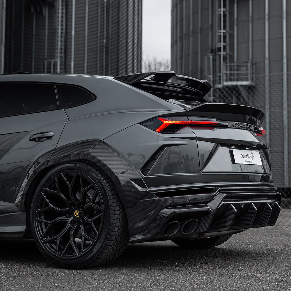 Lamborghini Urus carbon fibre boot spoiler by CT Carbon, sleek aerodynamic design on a luxury SUV.