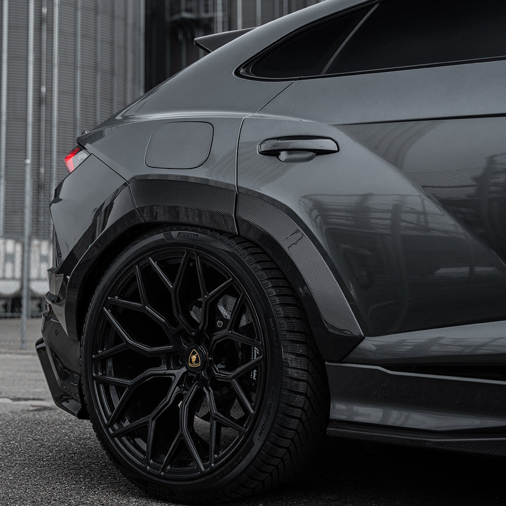 Lamborghini Urus with CT Design full carbon fibre arches, showcasing sleek, lightweight automotive upgrade on the car's side.