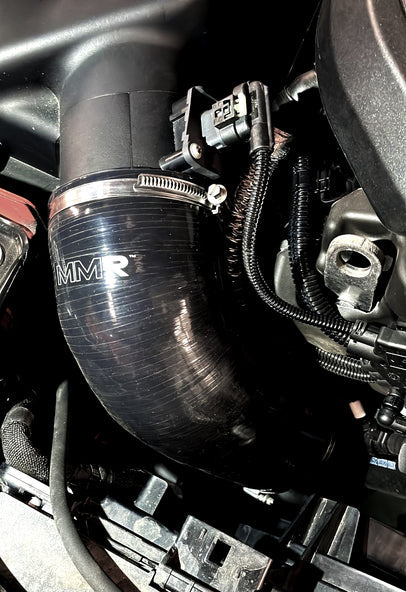 BMW M140i silicone intake hose from MMX Performance, showcasing flexible, durable engine part for enhanced airflow and performance.