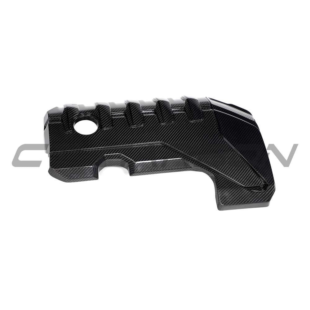 CT Carbon Audi RS3 8Y 2020+ carbon fibre engine cover kit displayed on a car engine for enhanced performance and style.