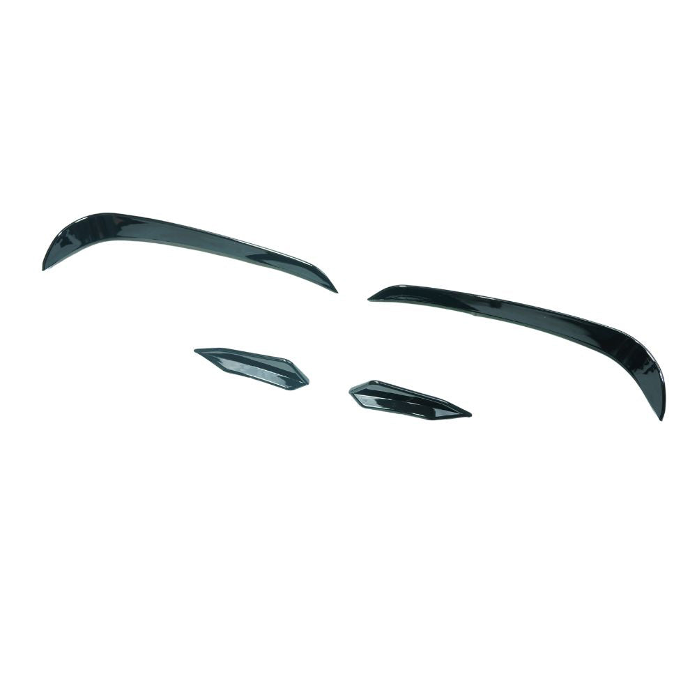 Gloss black canards for Volkswagen Golf R MK7 2013-2017, CT Carbon accessories, showing the aerodynamic design on the car's front edge.