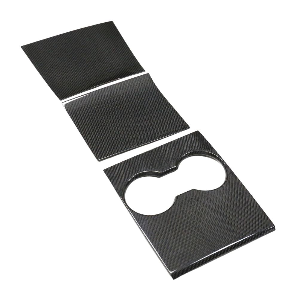 CT Carbon Tesla Model 3 2017-2023 carbon fiber center console add-on installed in a car interior.
