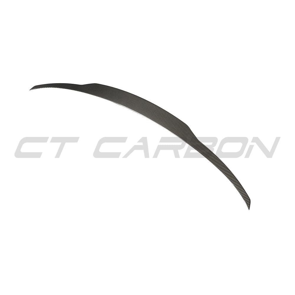 BMW X5 F15 X5M F85 2014-2018 carbon fibre middle spoiler by CT Carbon, showing sleek aerodynamic design on the vehicle's rear.