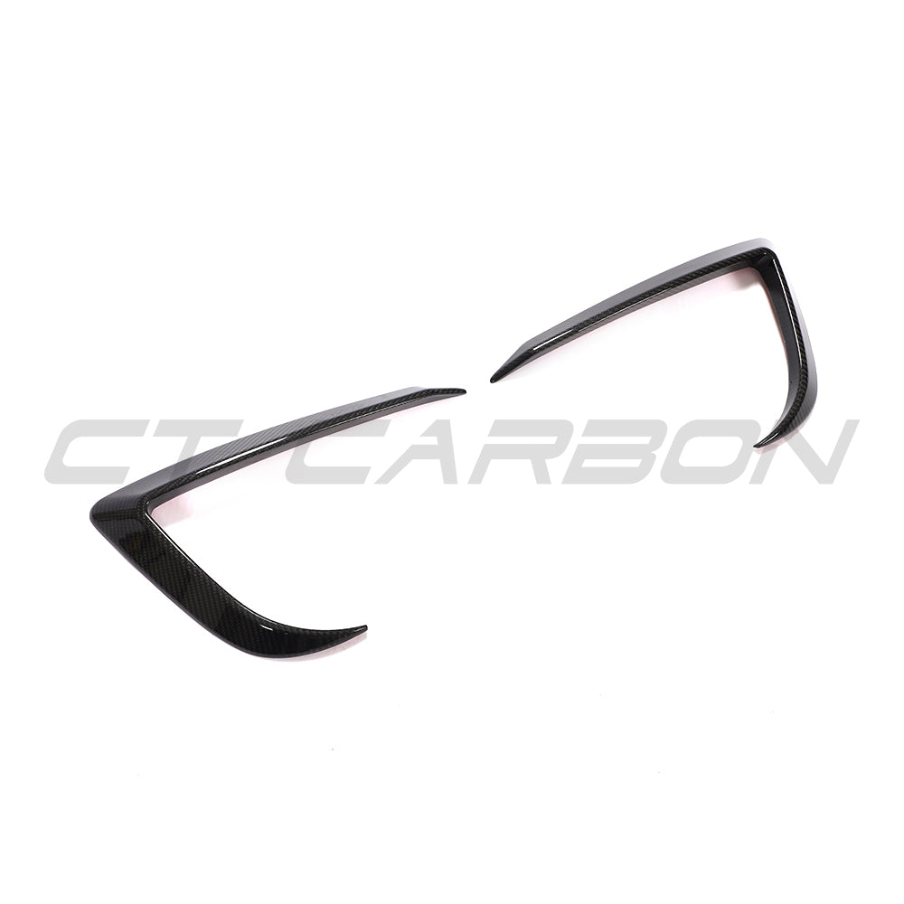 CT Carbon carbon fiber front bumper canards for Tesla Model 3 (2017-2023), automotive accessories, close-up of aerodynamic canards.