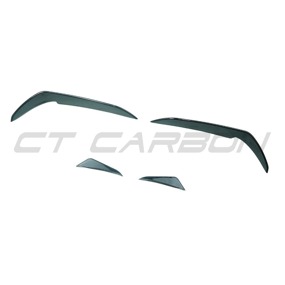 Gloss black front bumper canards for Volkswagen Golf GTI/GTD MK7/7.5 2017-2020 by CT Carbon, showcasing their aerodynamic design.
