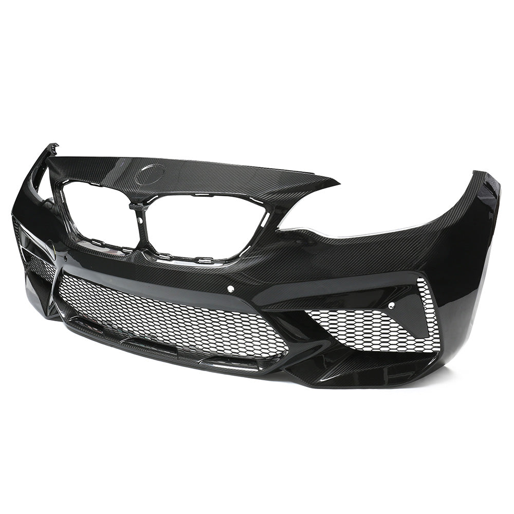 BMW F87 M2C carbon pre-preg fibre front bumper by CT Carbon showing sleek, lightweight design with aerodynamic features.