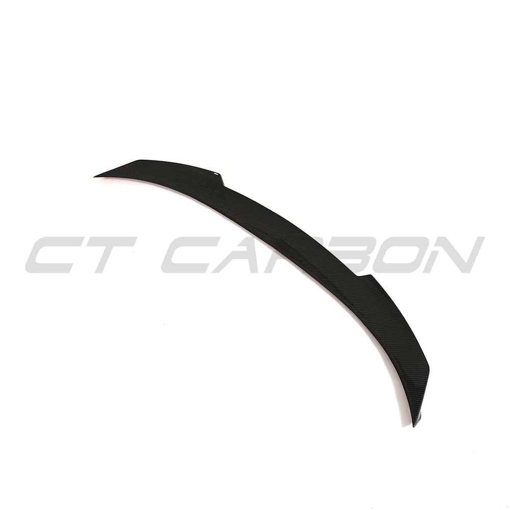 BMW G42 2 Series 2022+ CT Carbon full carbon fiber kit, including hood, spoiler, and side skirts, displayed on the car.