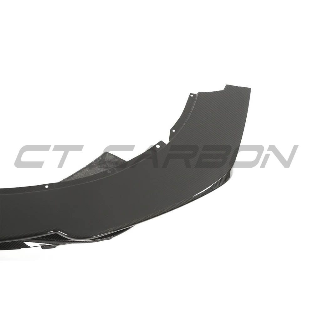 Carbon fiber splitter for McLaren 720S by CT Carbon, showcasing sleek design and lightweight construction.