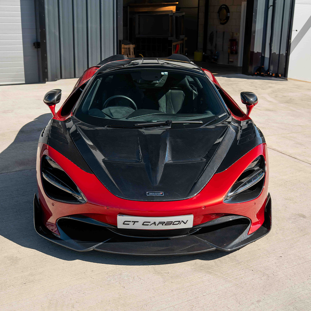 Carbon fiber splitter for McLaren 720S by CT Carbon, featuring aerodynamic design and V2 construction.