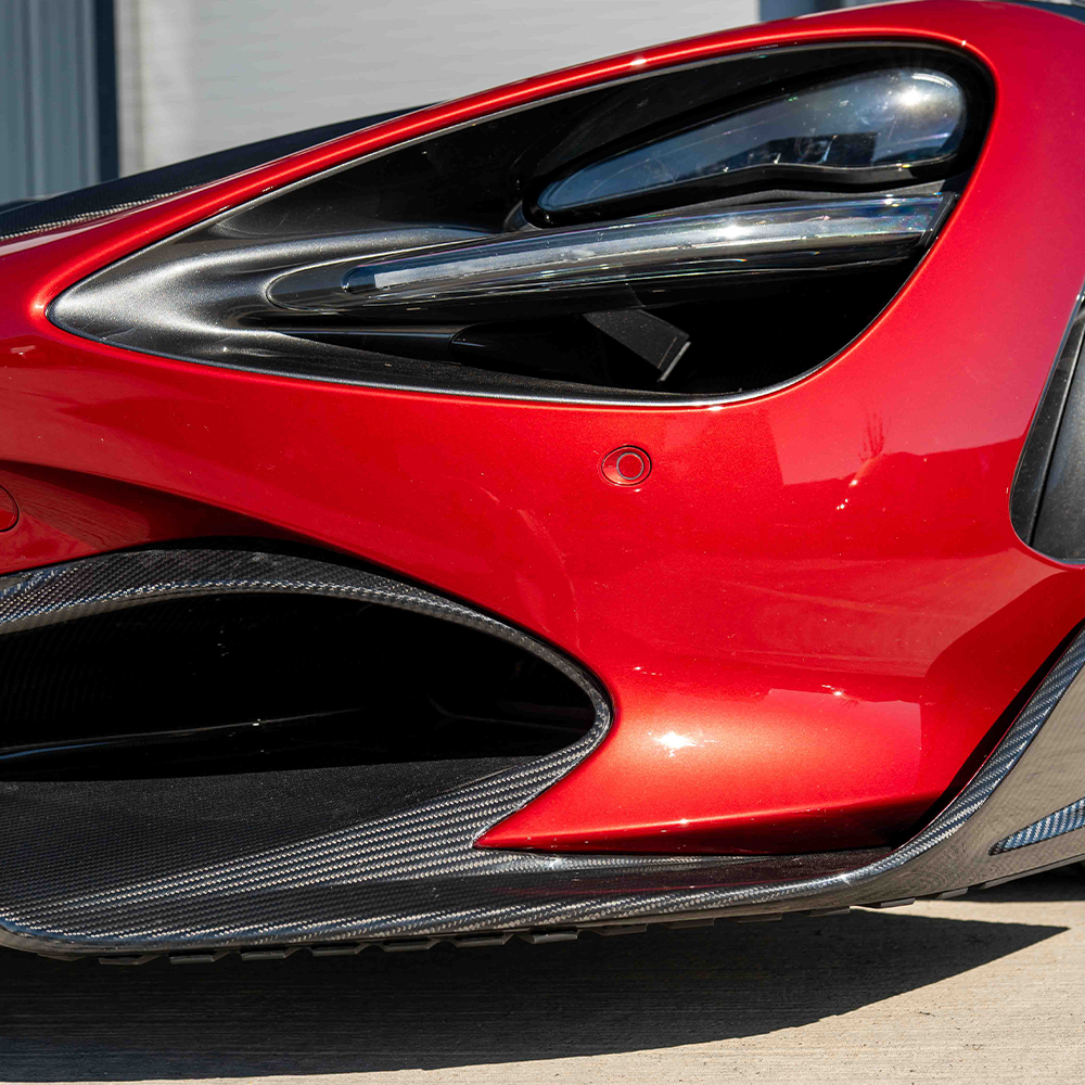 Carbon fiber splitter for McLaren 720S by CT Carbon, showcasing the sleek, aerodynamic design and finish of the CT Design V2 model.