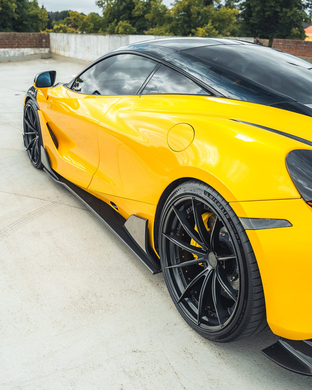 MCLAREN 720S full carbon fibre CT kit showing lightweight, glossy carbon fibre panels on the sports car.