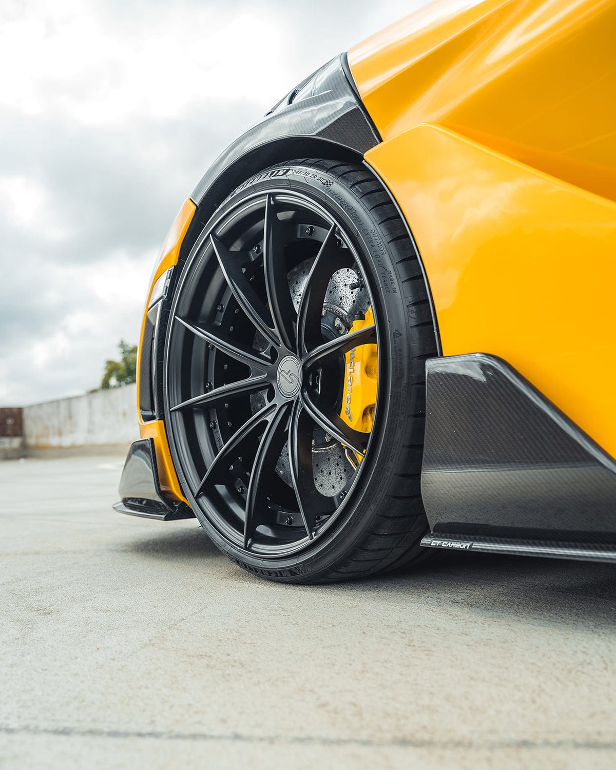 McLaren 720S full carbon kit by CT Carbon, showing lightweight carbon fiber body panels and aerodynamic design details.