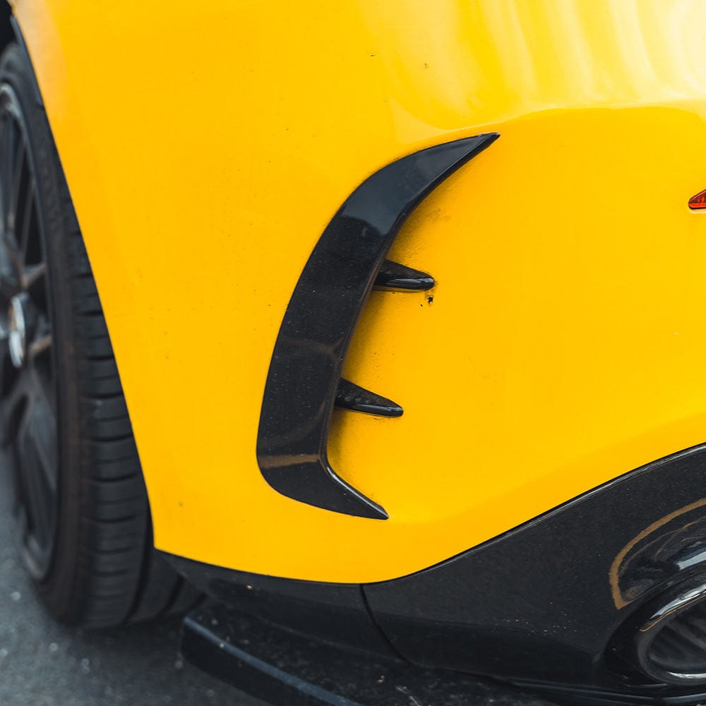 Mercedes A-Class A35 V177 gloss black rear bumper corners accessory by CT Carbon, close-up view of the sleek, high-quality car part.