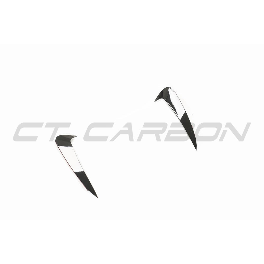 Mercedes C-Class & C43 W205 coupe gloss black rear bumper trim by CT Carbon, close-up view of sleek car accessory.