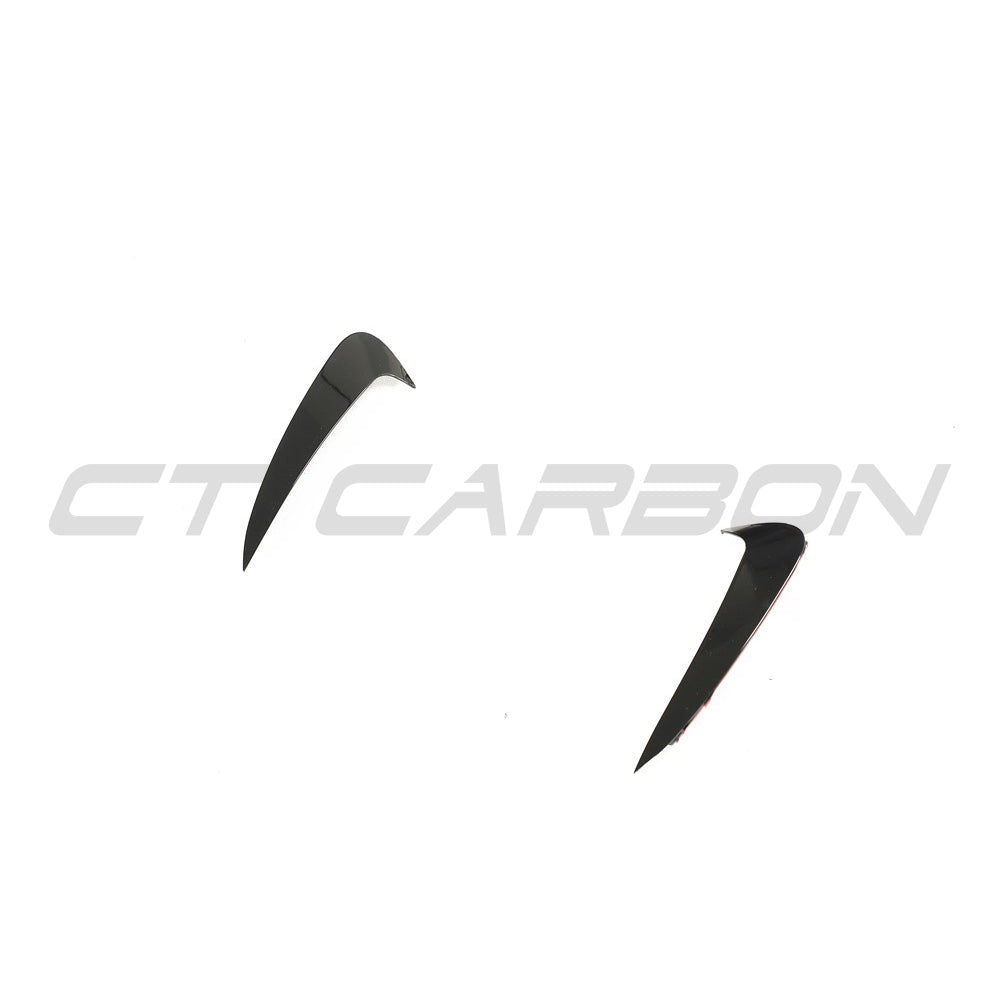 Gloss black rear bumper trim for Mercedes C-Class and C43 W205 coupe by CT Carbon, shown on the vehicle.