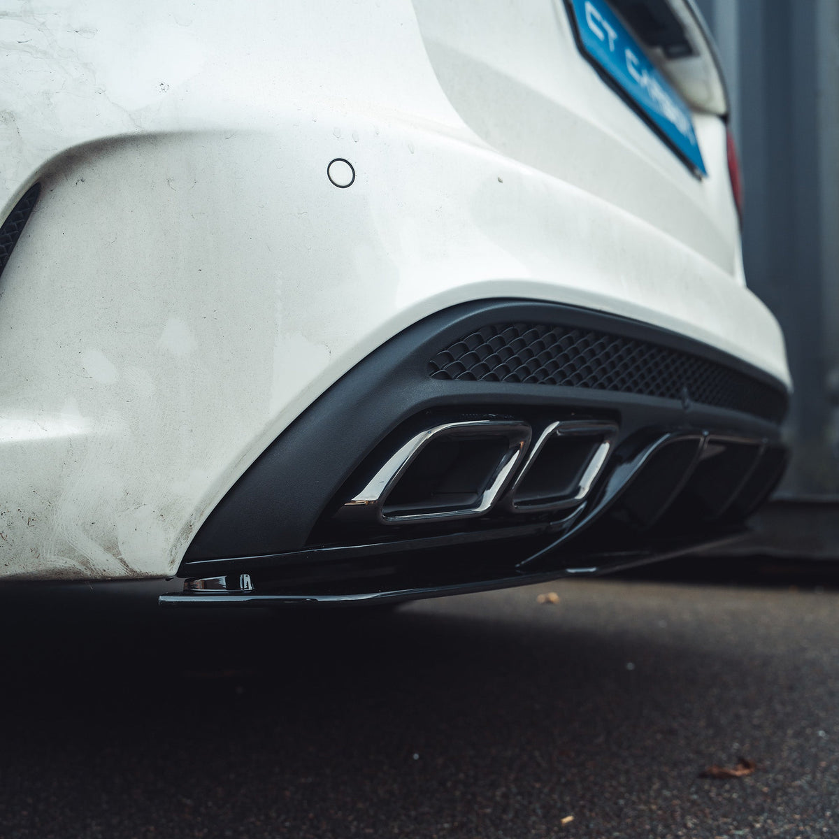 Mercedes C-Class W205 saloon estate diffuser with gloss black finish and black tips, by CT Carbon.
