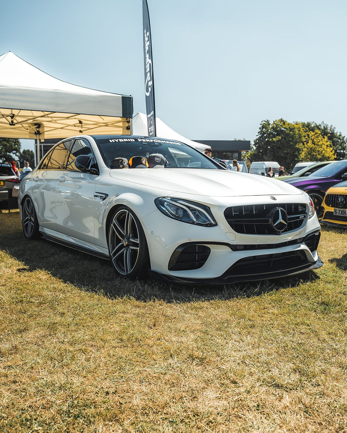 Mercedes E63 W213 2018-2020 pre-facelift carbon fibre side skirts by CT Design, showing sleek aerodynamic design and finish.